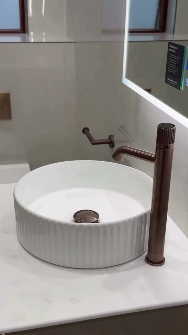 Fluted basin & bronze taps